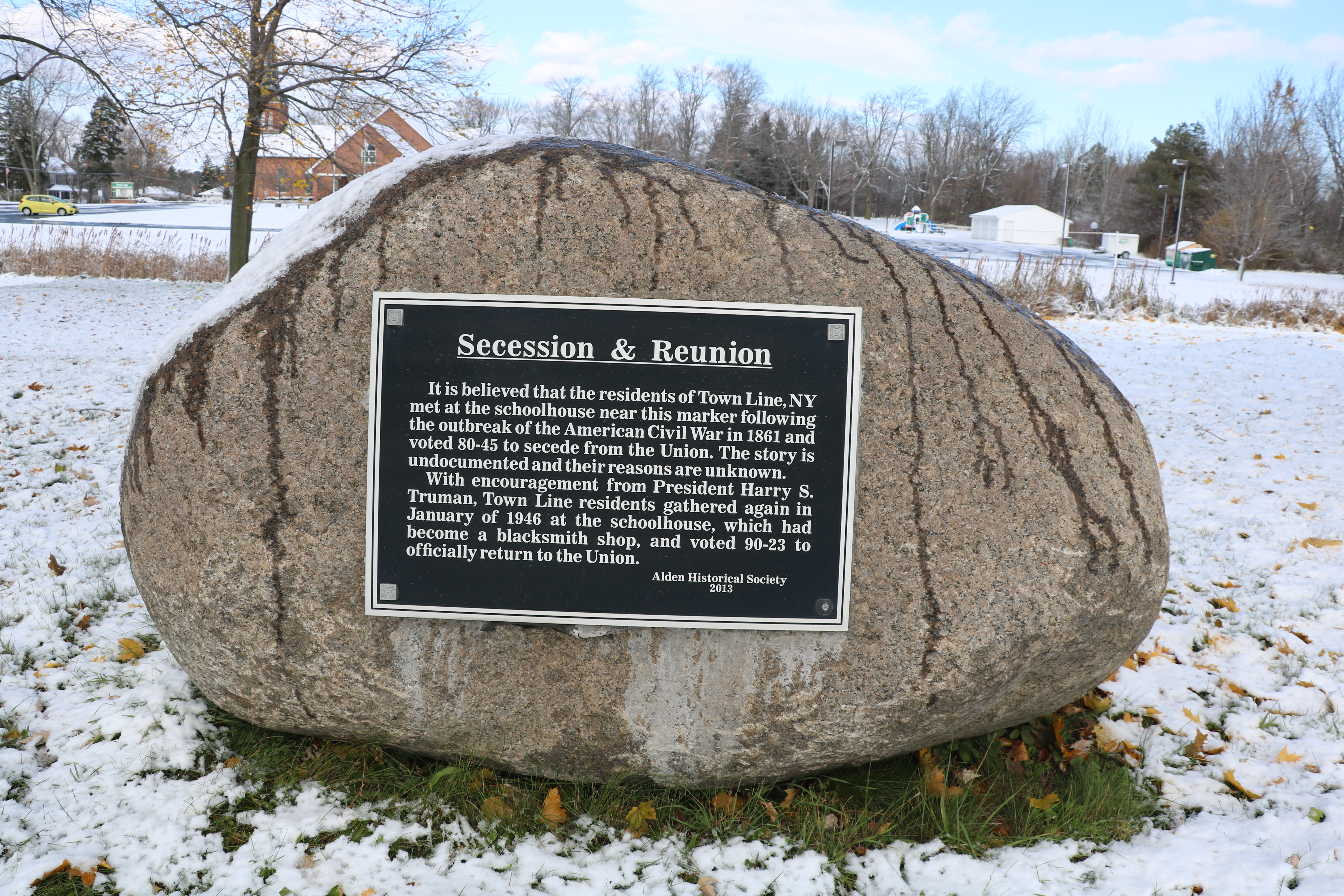 Secession & Reunion - It is believed that the residents of Town Line, NY met at the schoolhouse near the marker following the outbreak of the American Civil War in 1861 and voted 80-45 to secede from the Union. The story is undocumented and their reasons are unknown. With encouragement from President Harry S. Truman, Town Line residents gathered again in January of 1946 at the schoolhouse, which had become a blacksmith shop, and voted 90-23 to officially return to the Union. -Alden Historical Society (2013)